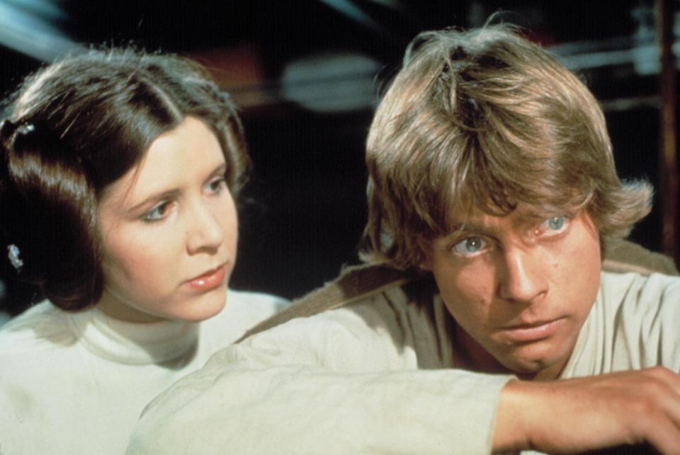 Mark Hamill, seen here as Luke Skywalker with Carrie Fisher as Princess Leia, sent his love to the actress 