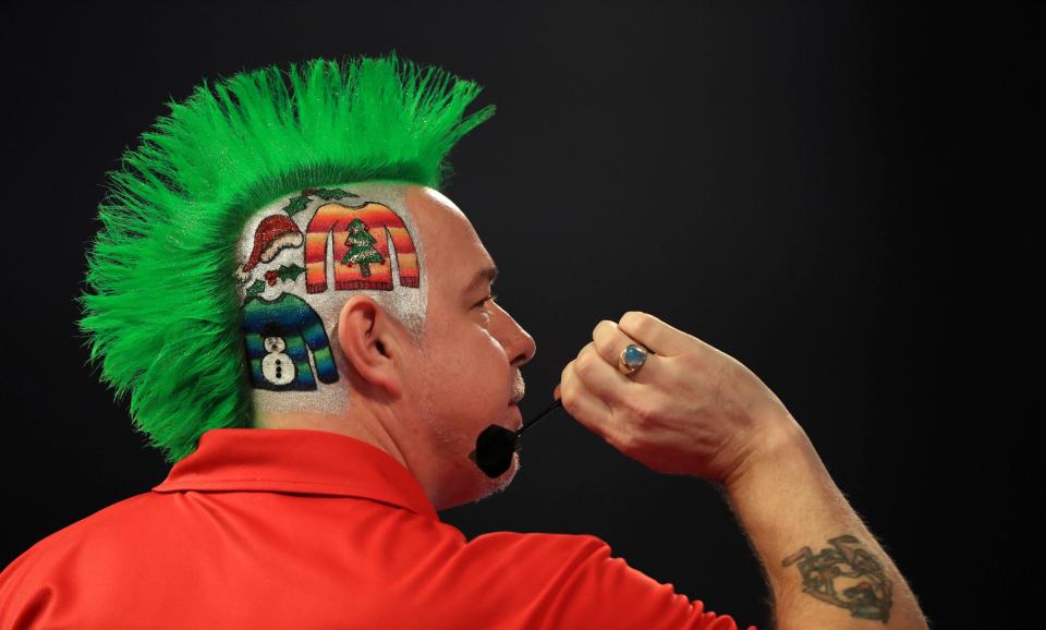 Peter Wright overcame Jerry Hendriks to advance