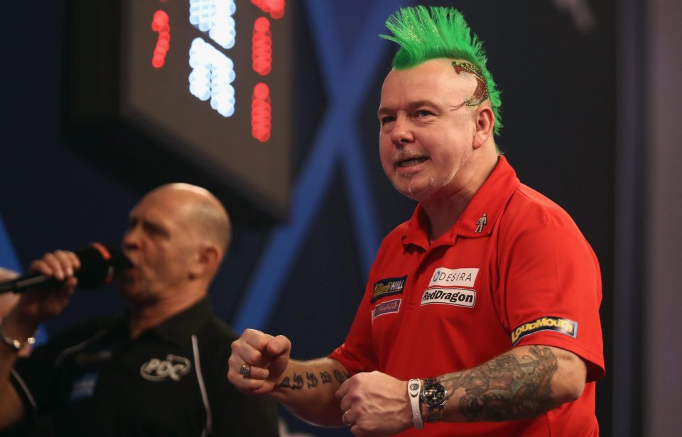  Peter Wright reacts to winning his match