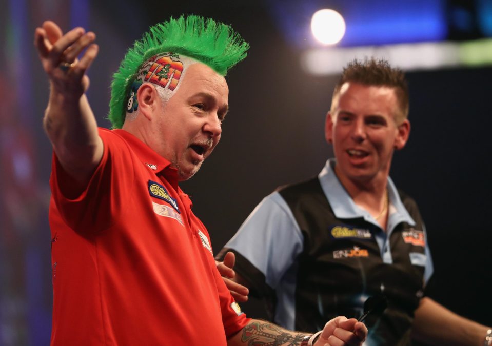 Peter Wright shares a joke with opponent Jerry Hendriks