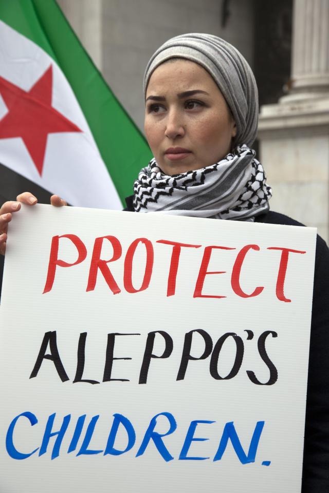  Angry protesters carried placards over Syria crisis