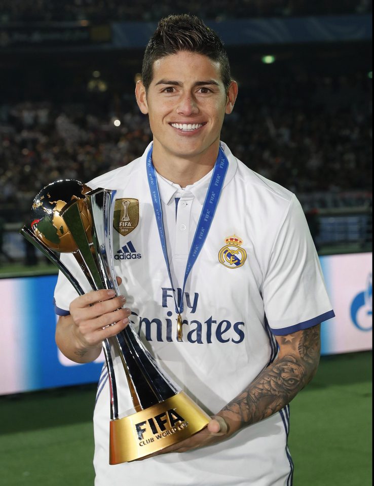  Rodriguez posing with the trophy