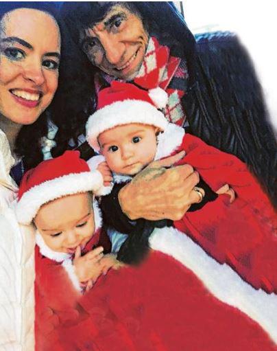  Ronnie Wood and wife Sally Humphreys pose with their adorable twin girls as they celebrate their first Christmas as a family of four