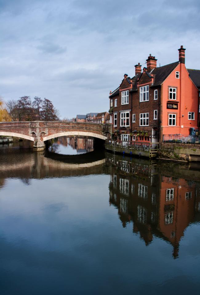  The river Wensum in Norwich casts a dazzling reflection of the tranquil scene