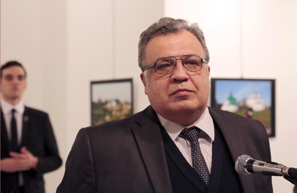  Andrei Karlov gives a speech as he visits an art fair at The Modern Art Centre in Ankara