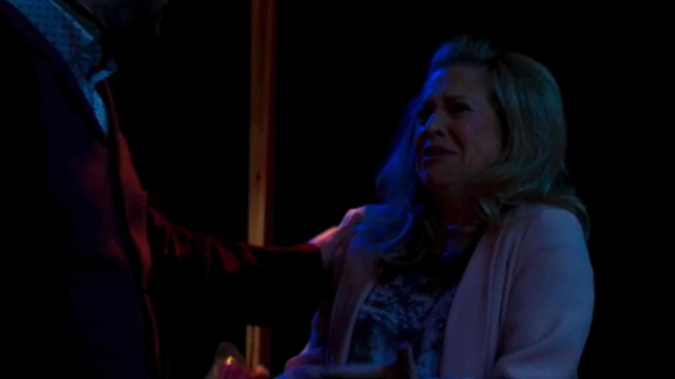  Linda Carter sobs but is comforted by husband Mick