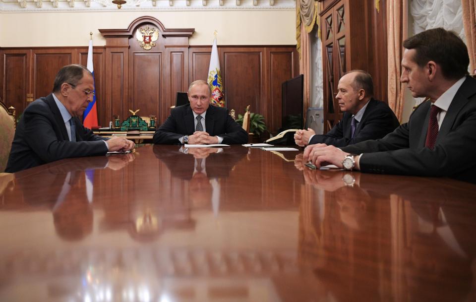  Russia's Foreign Minister Sergei Lavrov, President Vladimir Putin, Federal Security Service head Alexander Bortnikov, and Russian Foreign Intelligence Service chief Sergei Naryshkin meet