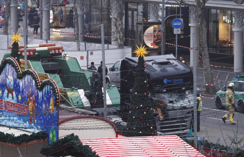  German police said they were treating as "a probable terrorist attack" when the speeding lorry cut a bloody swath through the packed Berlin Christmas market