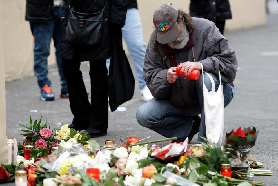  Floral tributes left close to the scene after a truck ploughed into a crowded Christmas market outside the Kaiser Wilhelm Memorial Church in Berlin