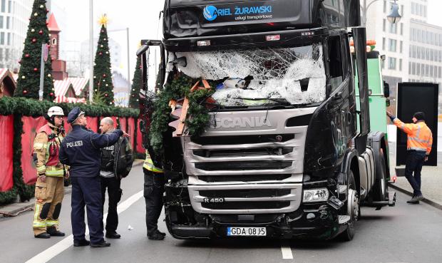 Christmas decorations hand from the windshield of the 25-tonne vehicle