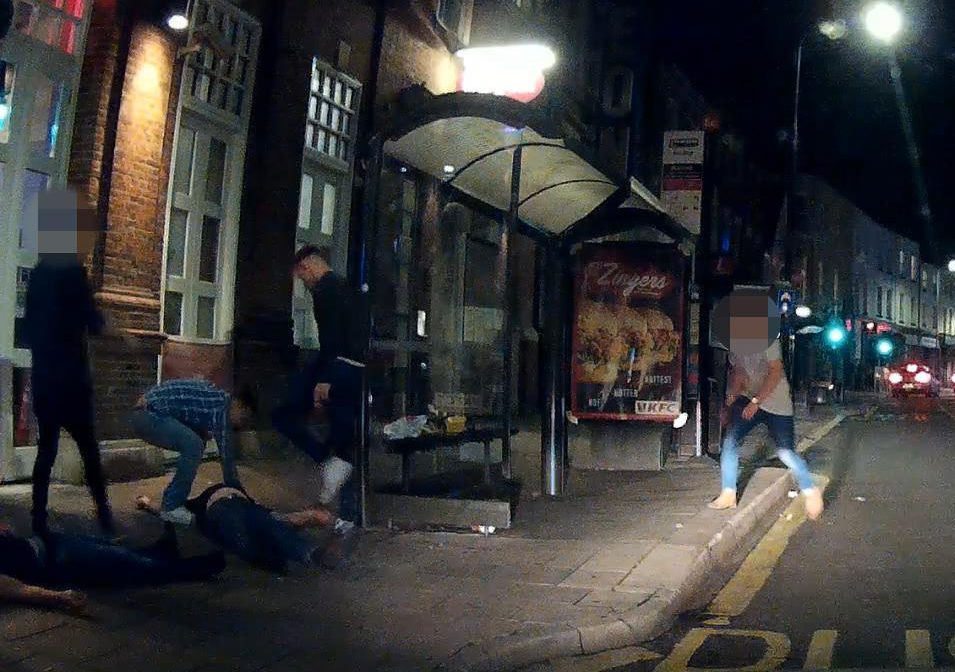  William Atkins and Zak Farmer can be seen kicking and punching the victim as he lies on the pavement