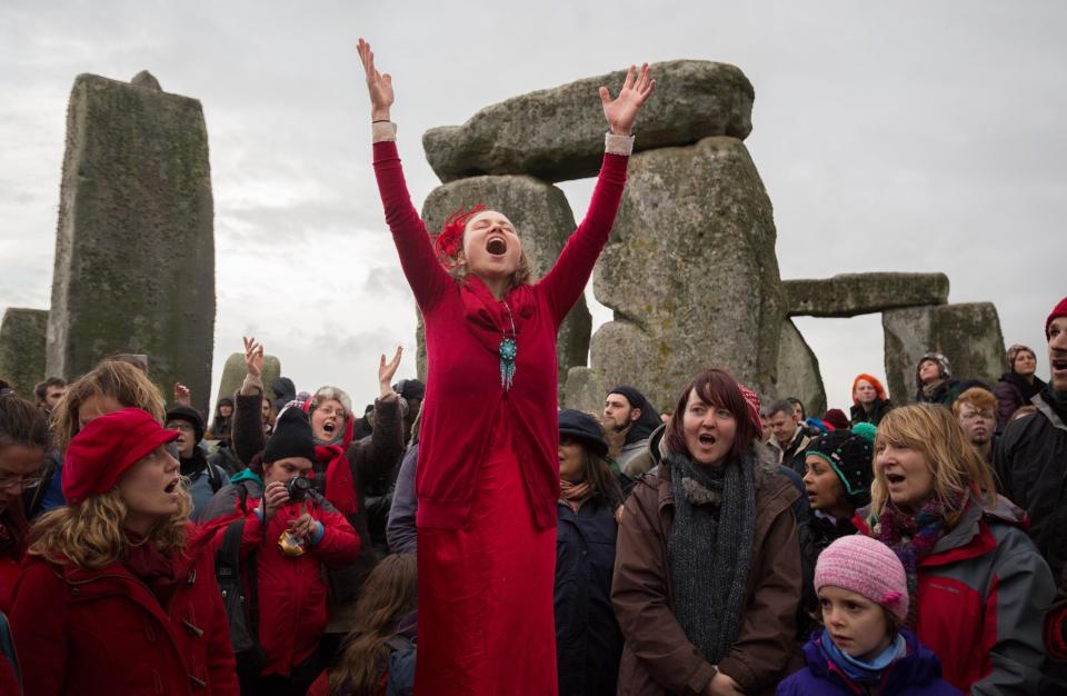  Susie Ro Prater leads the Shakti Sings choir as druids, pagans and revellers gather in the centre of Stonehenge