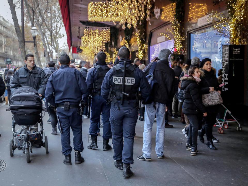  Police patrol outside the Galeries Lafayette department store in Paris, France, where the Berlin attack has stirred up chilling memories of the massacre in Nice in July