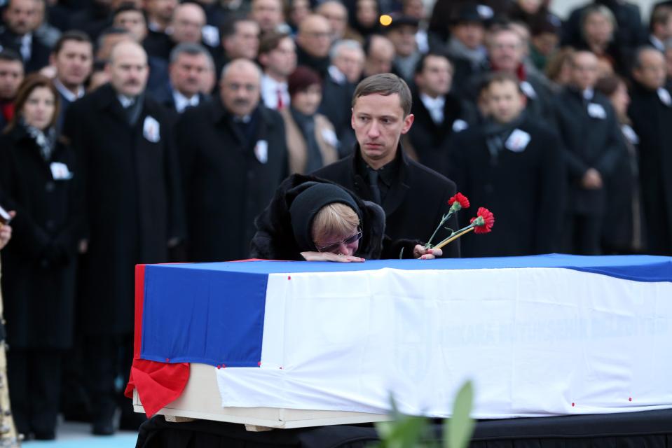  The late ambassador's coffin was flown back to Russia today