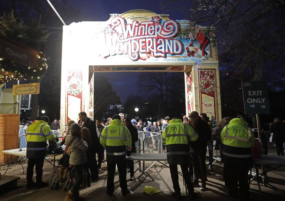  Security guards check bags at Winter Wonderland in Hyde Park, London, with undercover SAS operatives said to be patrolling shopping hot-spots across the UK