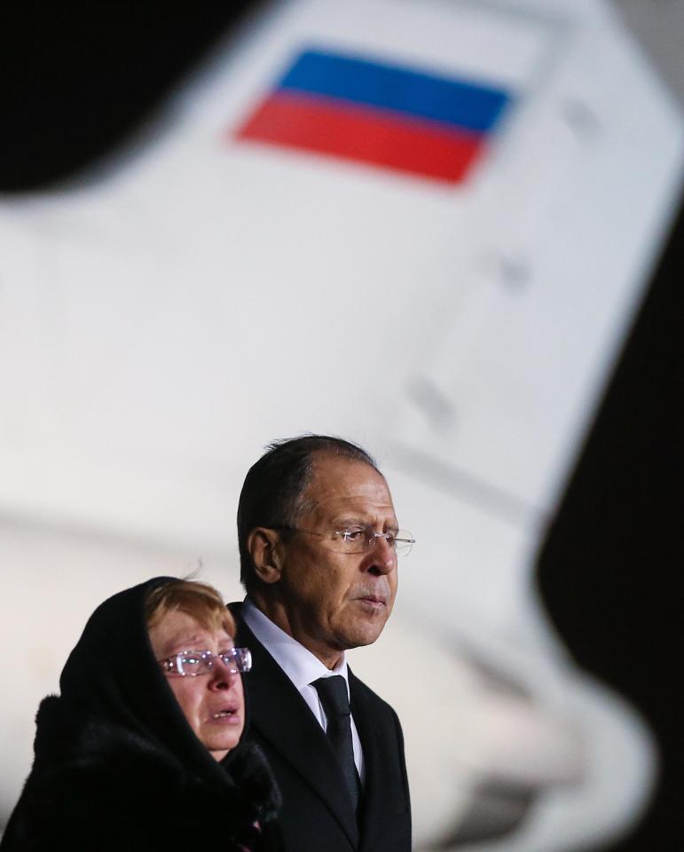  Andrei Karlov's widow Marina and Russia's Foreign Minister Sergei Lavrov attend a ceremony as the body of Russia's Ambassador to Turkey has been delivered to Vnukovo International Airport