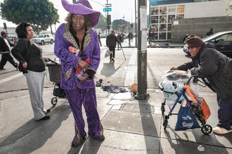 James also likes to show off his purple suit at 6th and San Pedro