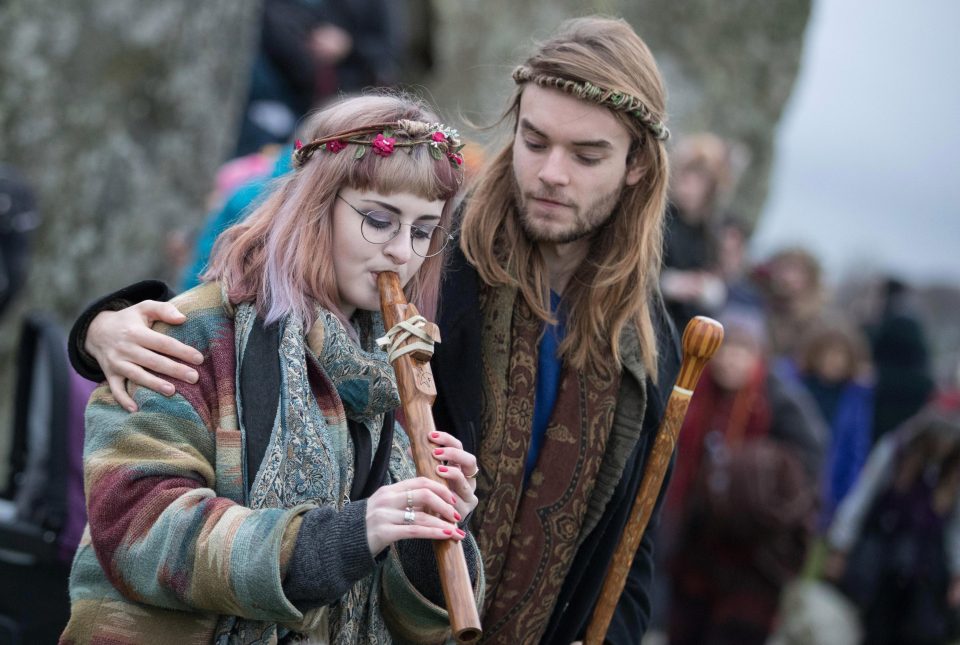  A woman provides her own soundtrack to proceedings by playing a whistle