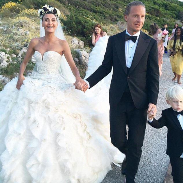 Giovanna tied the knot in a stunning ruffle gown by Sarah Burton for Alexander McQueen, while Oscar looked smart in a black suit