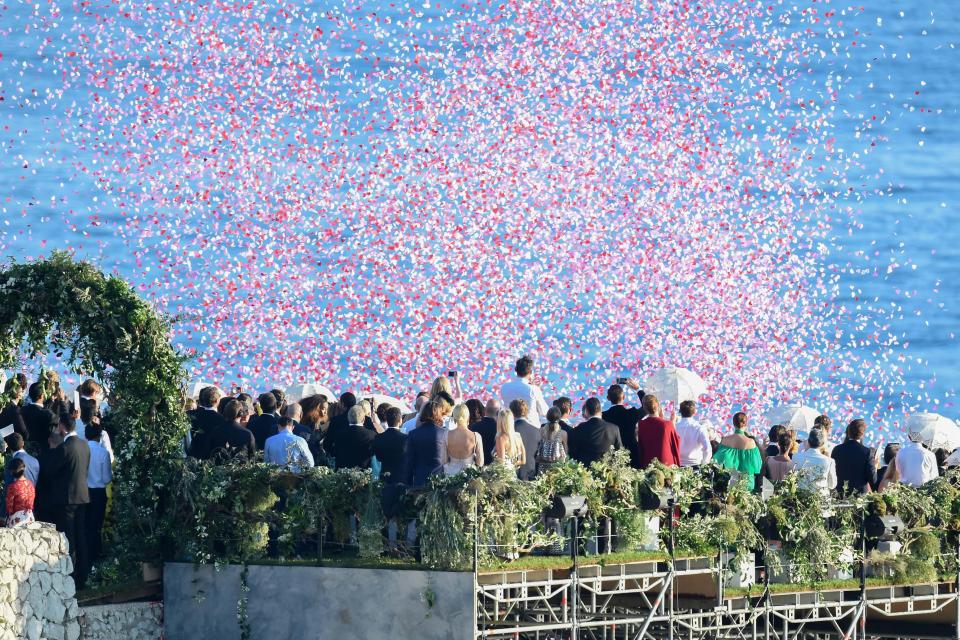 Confetti lit up the sky as the celebrity guests watched the romantic ceremony