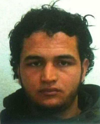  Police were hunting for a Tunisian man using the alias Anis Amri over the Berlin Market massacre attack