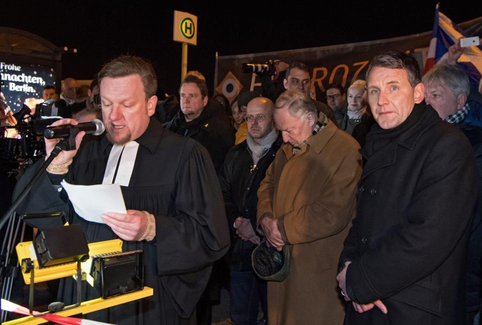 The chairman of the party, Bjoern Hoecke, right, addressed crowds