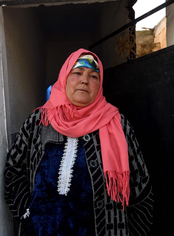  The suspected truck attacker's mother Nourhane Amri is pictured at the family home in Oueslatia in the Kairouan region of Tunisia