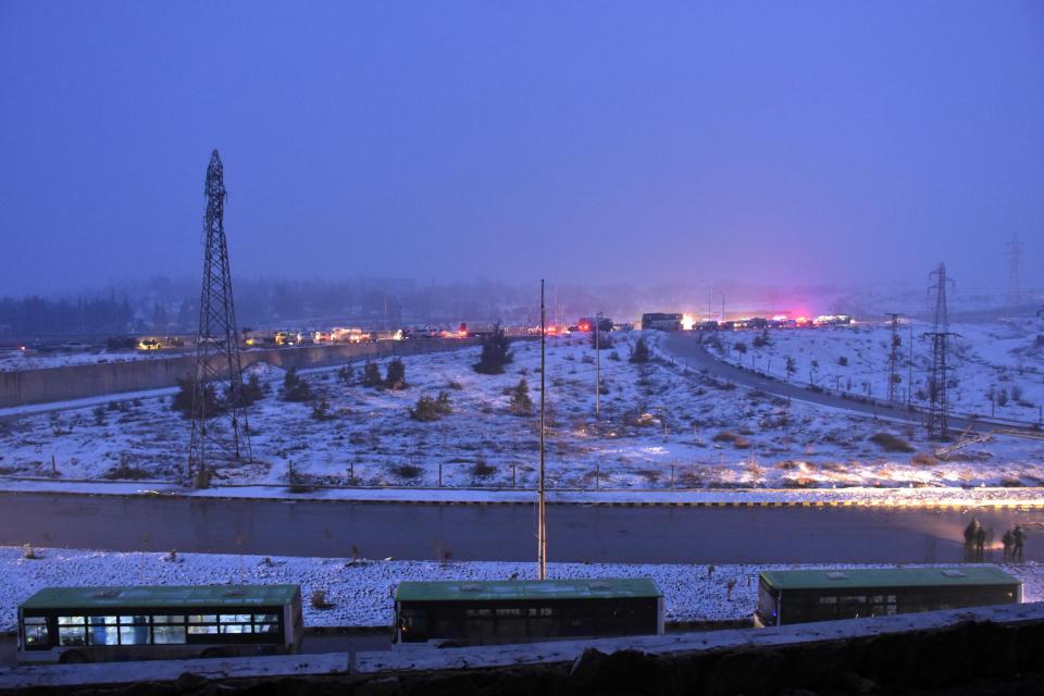  Buses continue to leave Aleppo as part of an evacuation pact that will see Government forces regain control of the city