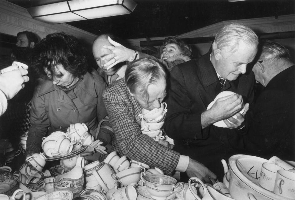  1977: Shoppers struggling in the china department of Harrods on the first day of the sale