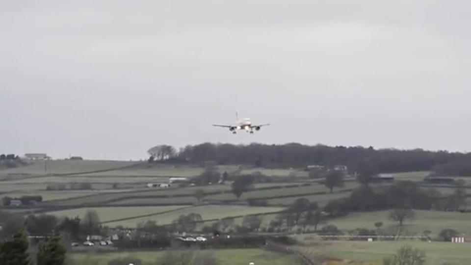  The plane begins rocking as it comes into land at Leeds Bradford airport