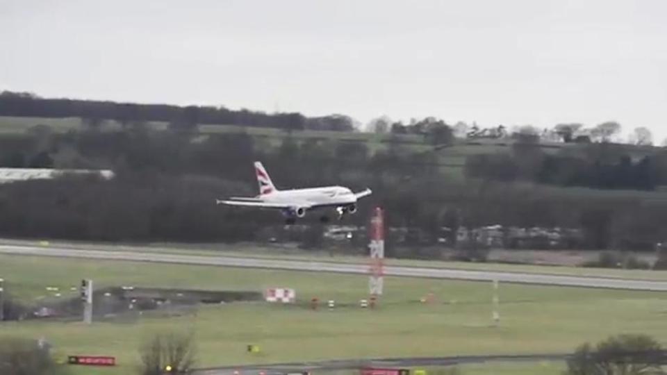  The passenger plane lurches violently as it nears the runway