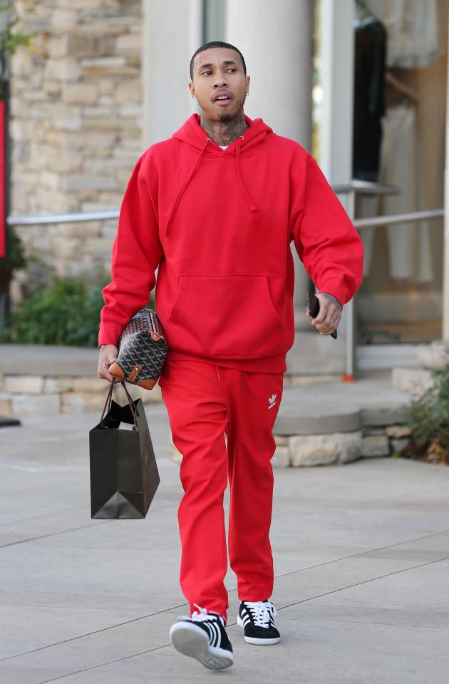  Tyga looked stony faced as he was spotted leaving upmarket Polacheck’s Jewellers