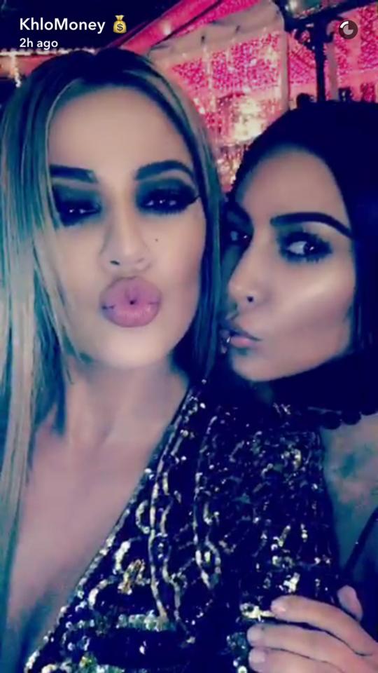  Kim and sister Khloe pout in the Snapchat vid