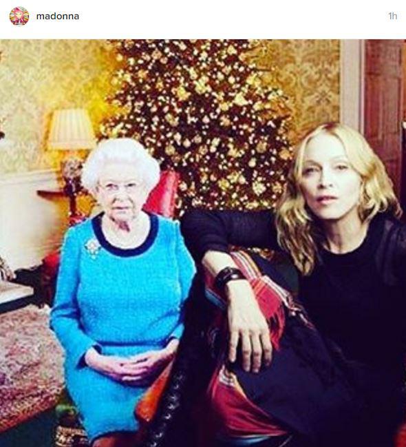  Madonna struck a cheeky pose by the Queen