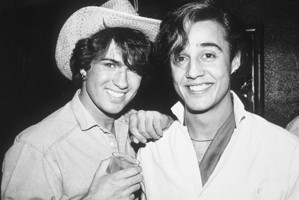  George Michael poses with fellow Wham! band member Andrew Ridgeley