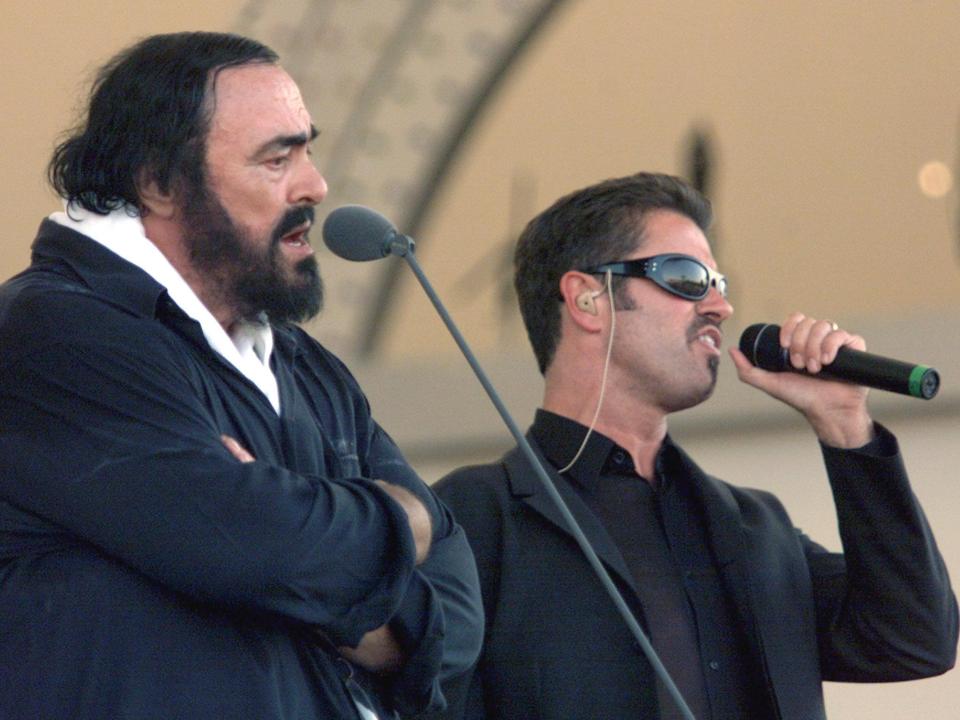  Wham! singer Michael on stage opera legend Luciano Pavarotti in 2000