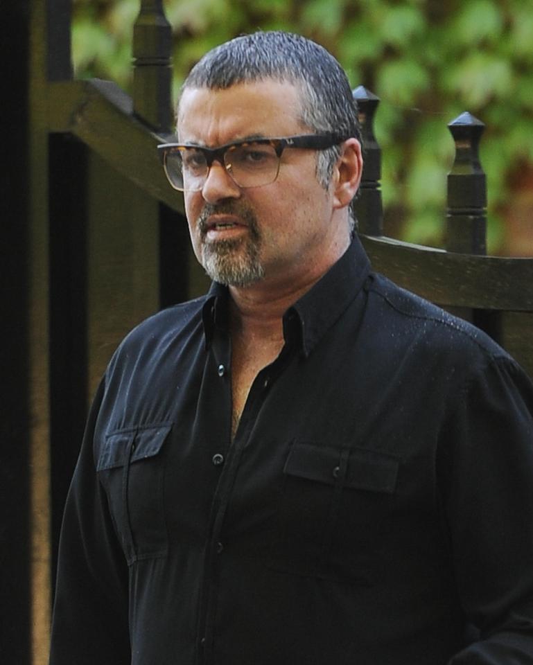  George Michael seen on a rare occasion outside his North London home