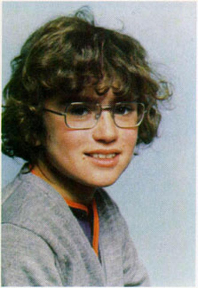  George Michael is pictured here as a child with a mop of curly hair and glasses