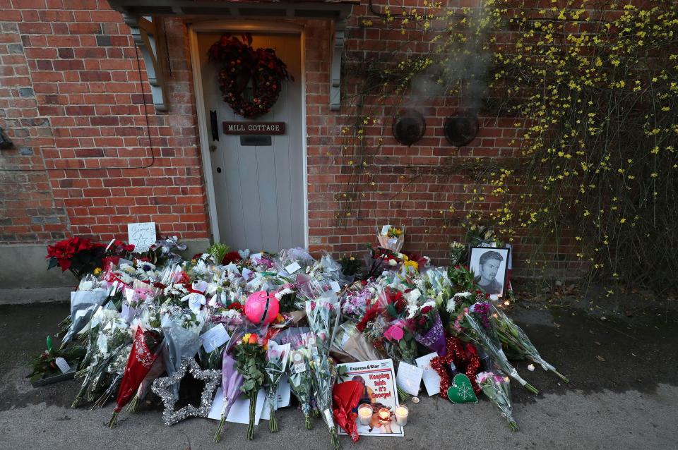  Tributes outside the Goring house of George Michael