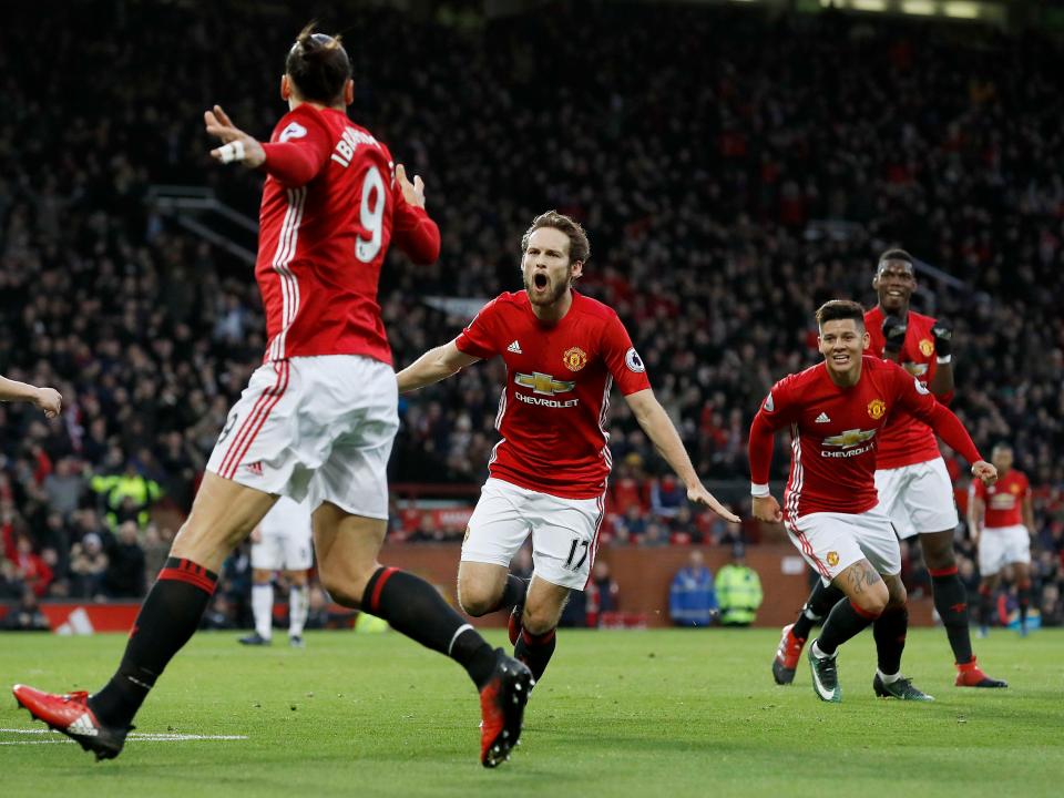 Daley Blind and Zlatan Ibrahimovic celebrate the Dutchman's opener for Manchester United