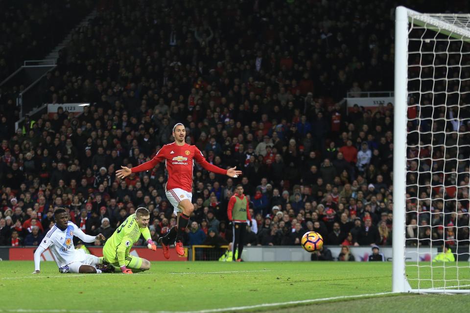 Zlatan Ibrahimovic celebrates netting his goal before the ball has even crossed the line