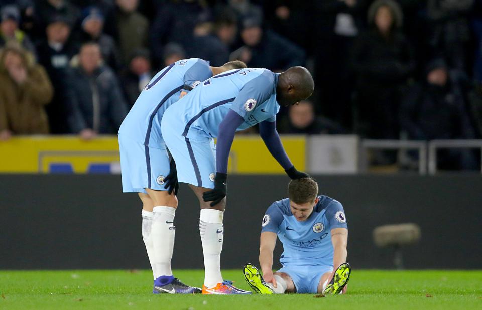  Manchester City players consoled John Stones whilst he was injured