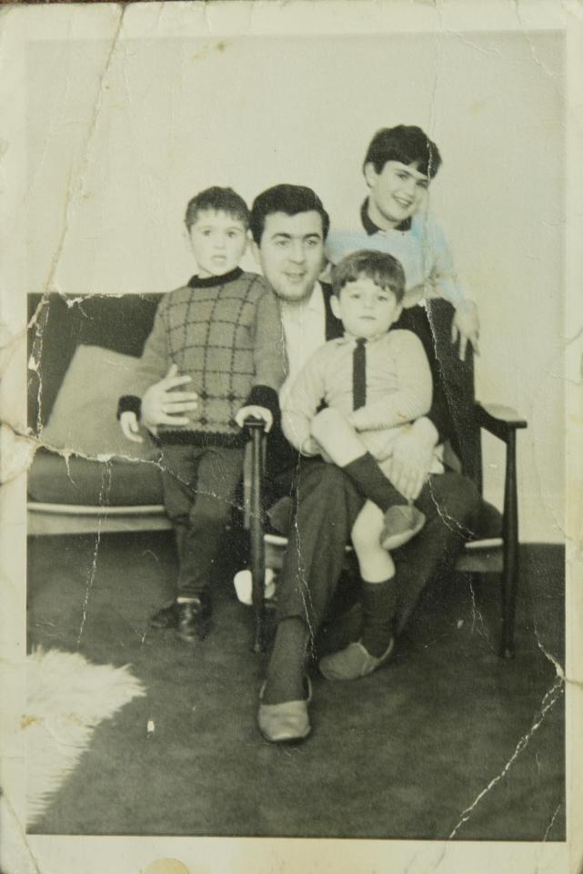  George Michael poses with his dad as a young boy