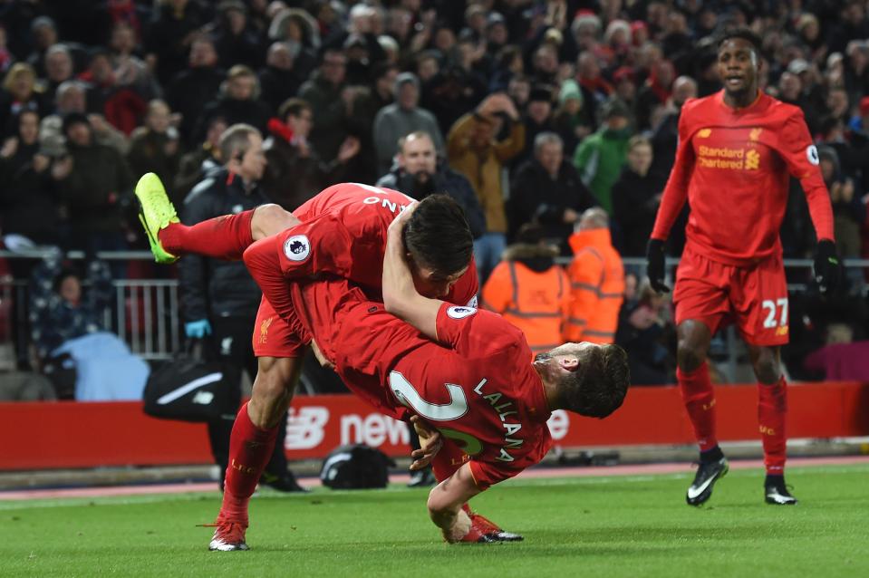 Roberto Firmino drops Adam Lallana as he celebrates putting Liverpool in front