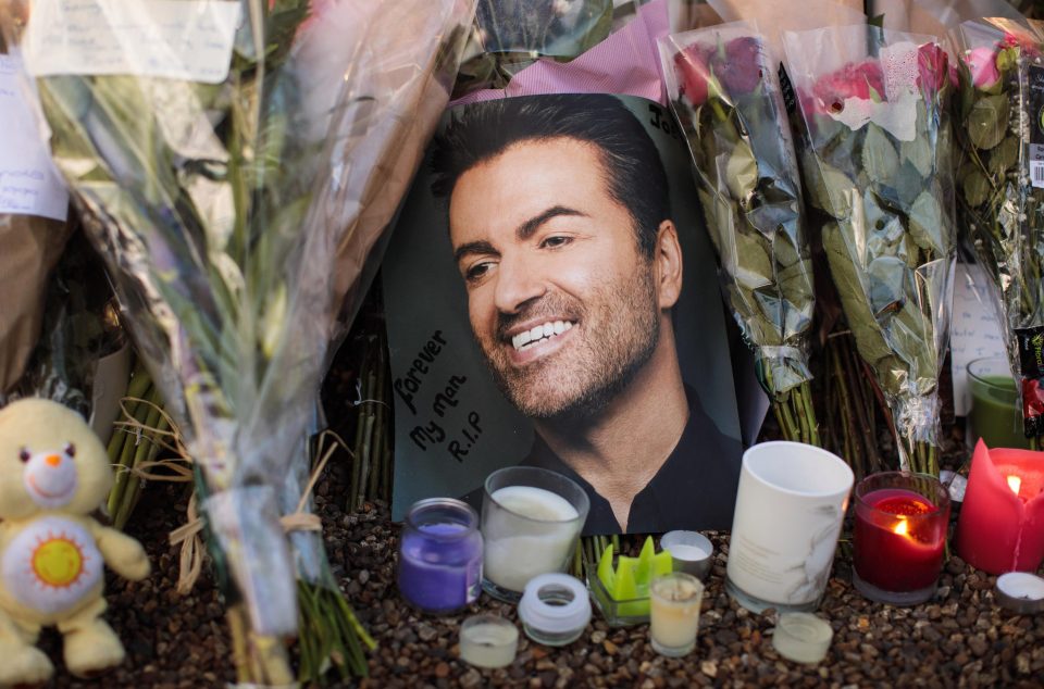  Tributes of flowers, photographs and candles left outside the home of pop music icon George Michael in Highgate today