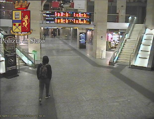  Berlin Christmas market terrorist Anis Amri casually walks through the Italian train station on December 22