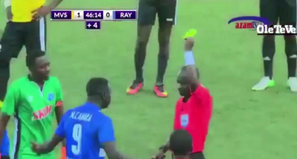 After being chased away by opponents, he is then booked by the referee