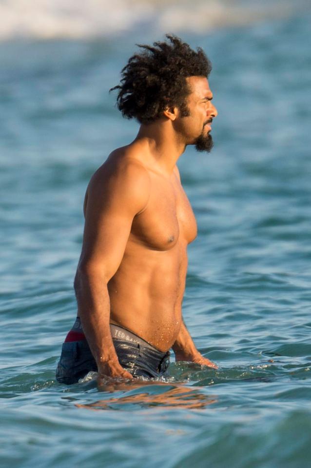  David Haye relaxes by taking a dip in the sea during break from training