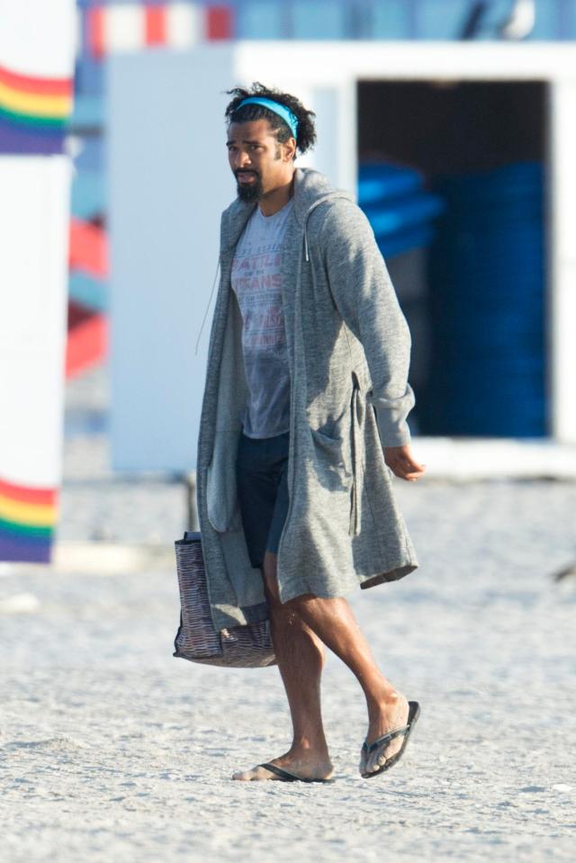  David Haye packs up his belongings as he leaves the beach