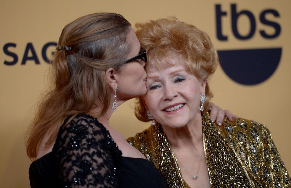 Carrie and Debbie, seen here in 2015, both passed away this week